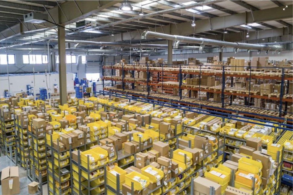 Warehouse shelves stocked with marketplace inventory
